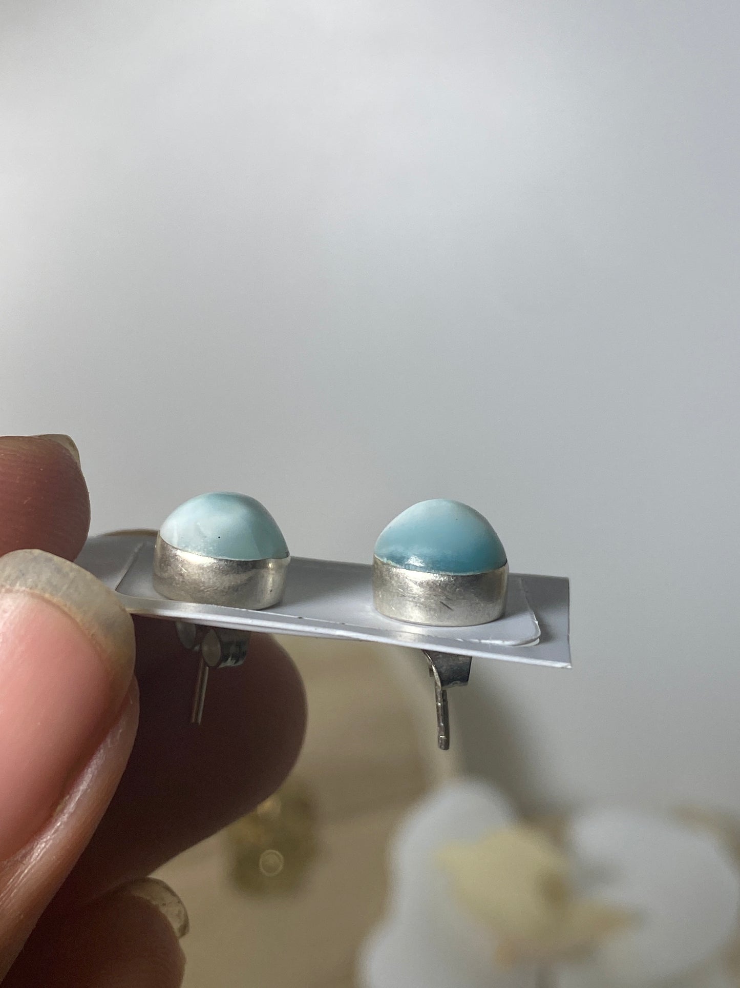 Larimar earplugs ( circle )